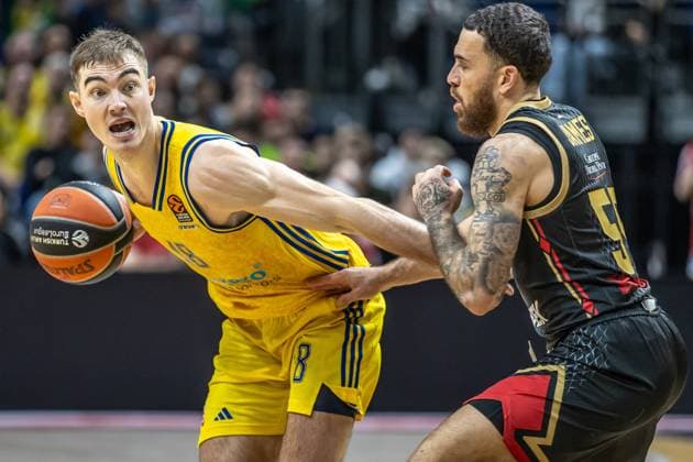 Berlin, 14 03 2024 Basketball EuroLeague, Main Round, Matchday 29, ALBA Berlin AS Monaco, Mercedes Benz Arena ALBAs Ziga Samar fights for the ball against AS Monacos James Mike ALBA BERLIN AS Monaco