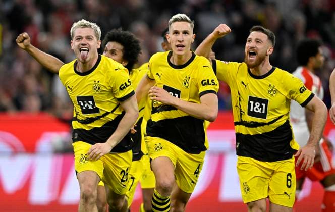 GOAL at 0 2 Julian Ryerson Borussia Dortmund BVB 26 Goal celebration Salih Oezcan Borussia Dortmund BVB 06 Nico Schlotterbeck Borussia Dortmund BVB 04 FC Bayern Muenchen FCB vs Borussia Dortmund BVB 30 03 2024 DFL REGULATIONS PROHIBIT ANY USE OF PHOTOGRAPHS AS IMAGE SEQUENCES AND OR QUASI VIDEO FC Bayern Muenchen FCB vs Borussia Dortmund BVB