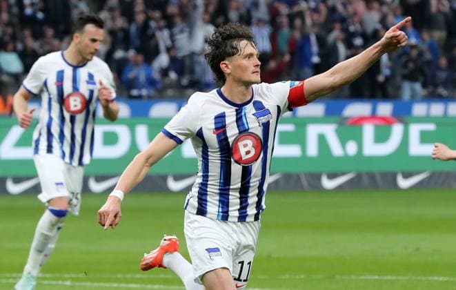 Fabian Reese cheers after 2 0 joy emotion jubilation sport soccer soccer DFL 2 Bundesliga men 29 matchday season 2023 2024 12 04 2024 Hertha BSC Berlin vs FC Hansa Rostock DFL regulations prohibit any use of photographs as image sequences and or quasi video