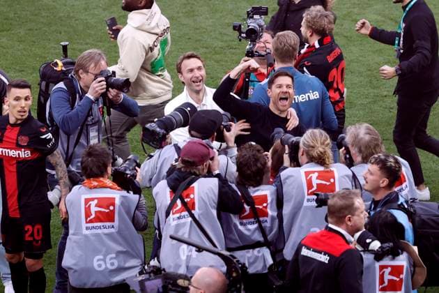 ALONSO Xabier Coach Team Bayer 04 Leverkusen Celebrates after winning the German Championship with Sports Director ROLFES Simon DFL Bundesliga Season 2023 2024 Bundesliga Match Bayer 04 Leverkusen Werder Bremen Bayer Leverkusen German Football Champion 2024 on 14 04 2024 in Leverkusen DFL REGULATIONS PROHIBIT ANY USE OF PHOTOGRAPHS as IMAGE SEQUENCES and or QUASI VIDEO Copyright: xLacixPerenyix