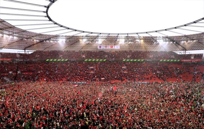 FANS Team Bayer 04 Leverkusen storm the pitch in the 89 game minute DFL Bundesliga season 2023 2024 Bundesliga match Bayer 04 Leverkusen Werder Bremen Bayer Leverkusen German Football Champion 2024 on 14 04 2024 in Leverkusen DFL REGULATIONS PROHIBIT ANY USE OF PHOTOGRAPHS as IMAGE SEQUENCES and or QUASI VIDEO Copyright: xLacixPerenyix
