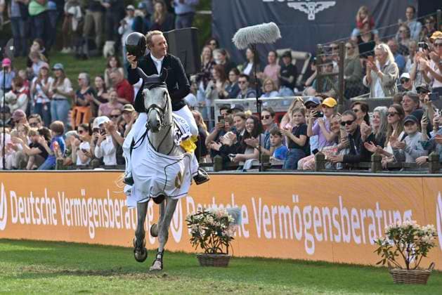 GER German Jumping and Dressage Derby, CSI5 Prize of Deutsche Vermoegensveratung AG DVAG 09 05 2024, GER Kleinflottbek, German Jumping and Dressage Derby, CSI5 Prize of Deutsche Vermoegensveratung AG DVAG, in the picture winner David Will GER on My Prins van Dorperheide on the lap of honor nordphotoxGmbH xWitke nph00002