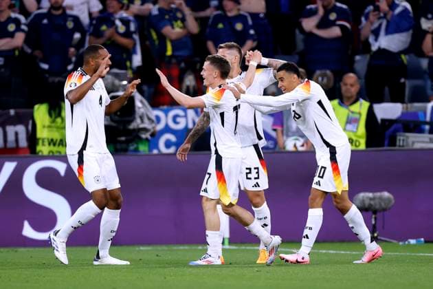 WIRTZ Florian Team Germany cheers after his goal for 1 0 with MUSIALA Jamal UEFA Football EURO 2024 in Germany Opening match Germany Scotland on 14 06 2024in Munich DFL REGULATIONS PROHIBIT ANY USE OF PHOTOGRAPHS as IMAGE SEQUENCES and or QUASI VIDEO Copyright: xLacixPerenyix