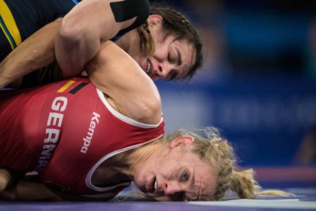 240809 Sandra Paruszewski of Germany competes against Giullia Penalber of Brazil in a women s wrestling 62 kg round of 16 during day 14 of the Paris 2024 Olympic Games on August 9, 2024 in Paris Photo Maxim ThorÃ BILDBYRAN code MT MT0651 wrestling wrestling olympic games olympics os ol olympiska spel olympiske leker paris 2024 paris os paris ol 14 bbeng norge sextondelsfinal  Copyright: MAXIMxTHORE BB240809MT056