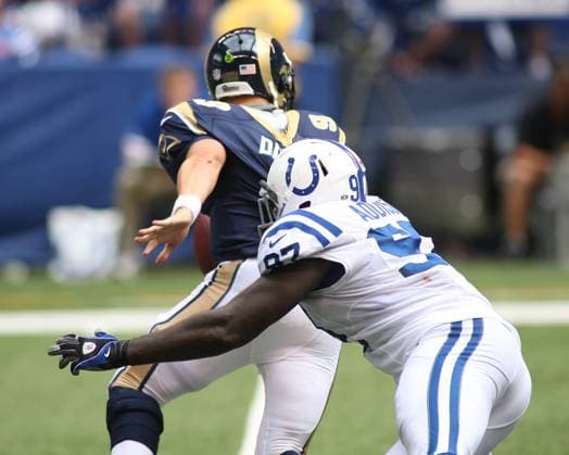 NFL, American Football Herren, USA 2012: Rams vs Colts AUG 12 August 12, 2012: Indianapolis Colts linebacker Mario Addison (97) chases down St. Louis Rams quarterback Austin Davis (9) during an NFL game between the St. Louis Rams and the Indianapolis Colts at Lucas Oil Stadium in Indianapolis, IN. The Colts defeated the Rams by a score of 38-3(Credit Image: Pat Lovell Cal Media) Indianapolis Indiana United States EDITORIAL USE ONLY Copyright: xx ZUMA-20120812_zaf_c04_103.jpg PatxLovellx csmphoto628274