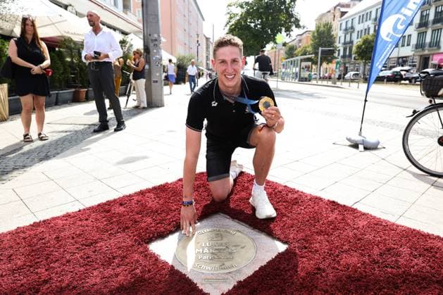 Swimmer Lukas Märtens SC Magdeburg ceremonial unveiling of a granite bronze plaque for Olympic champion Lukas Märtens on the ÒSports Walk of FameÓ in Magdeburg Swimming,Germany,03 09 2024