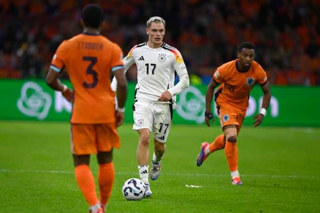 Florian WIRTZ GER vs Jurrien TIMBER NED and Quinten TIMBER NED action, duel, Soccer Nations League Netherlands NED Germany GER 2 2 on 10 09 2024 at Amsterdam Arena Johan Cruyff Arena in Amsterdam Netherlands