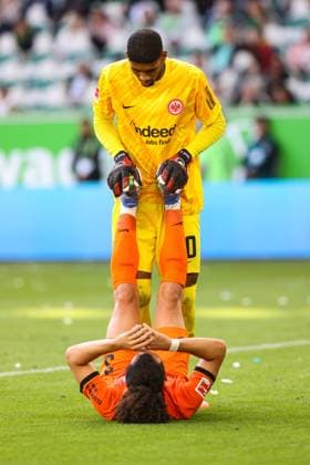 Goalkeeper Kaua Santos Eintracht Frankfurt,40 with Arthur Theate Eintracht Frankfurt,3 1 Soccer Bundesliga Season 2024 2025 Point Match VfL Wolfsburg vs Eintracht Frankfurt at the Volkswagen Arena in Wolfsburg Action,Soccer,Germany,Man,Men,14 09 2024