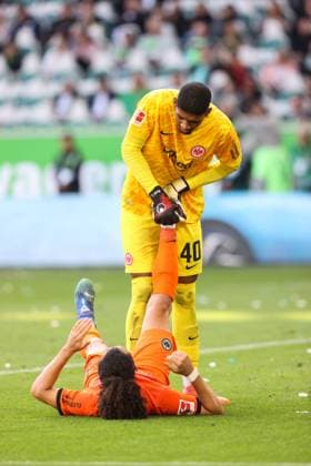 Goalkeeper Kaua Santos Eintracht Frankfurt,40 with Arthur Theate Eintracht Frankfurt,3 1 Soccer Bundesliga Season 2024 2025 Point Match VfL Wolfsburg vs Eintracht Frankfurt at the Volkswagen Arena in Wolfsburg Action,Soccer,Germany,Man,Men,14 09 2024