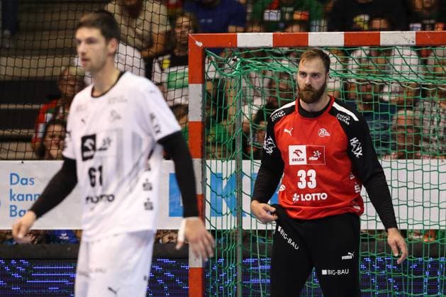 Goalkeeper Andreas Wolff THW Kiel,33 and Hendrik Pekeler THW Kiel,61 Handball Bundesliga Season 2024 2025 SC Magdeburg vs THW Kiel at the GETEC Arena in Magdeburg Action,Handball,Germany,22 09 2024