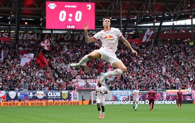 Benjamin Sesko cheers after 1 0 joy emotion jubilation Sport Football Soccer DFL Bundesliga Men 5 Matchday Season 2024 2025 28 09 2024 RasenBallsport RB Leipzig RBL vs FC Augsburg FCA at RedBull Arena DFL regulations prohibit any use of photographs as image sequences and or quasi video
