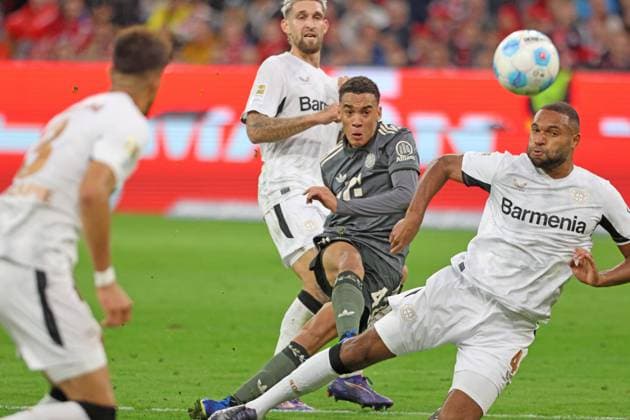 42 Jamal Musiala FCB vs 4 Jonathan Tah Leverkusen duel Football 1 BL FC Bayern Muenchen Bayer 04 Leverkusen 28 09 2024 Allianz Arena PHOTO Mladen Lackovic LakoPress
