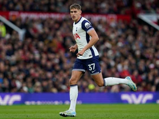 Manchester, England, 29th September 2024. Micky van de Ven of Tottenham during the Premier League match at Old Trafford, Manchester. Picture credit should read: Andrew Yates Sportimage EDITORIAL USE ONLY. No use with unauthorised audio, video, data, fixture lists, club league logos or live services. Online in-match use limited to 120 images, no video emulation. No use in betting, games or single club league player publications. SPI-3344-0140