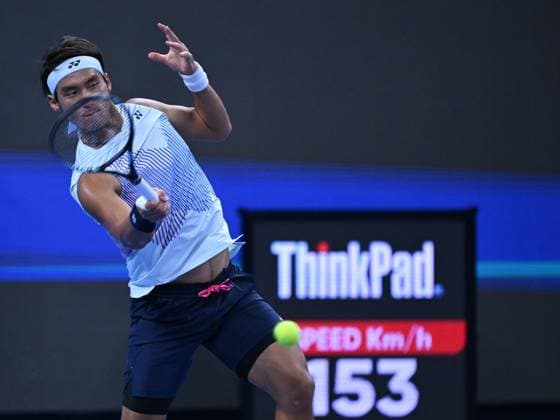 (241001) -- BEIJING, Oct. 1, 2024 -- Bu Yunchaokete of China hits a return during the men s singles semi-final match against Jannik Sinner of Italy at 2024 China Open tennis tournament in Beijing, capital of China, Oct. 1, 2024. ) (SP)CHINA-BEIJING-TENNIS-CHINA OPEN-MEN S SINGLES (CN) ZhangxLong