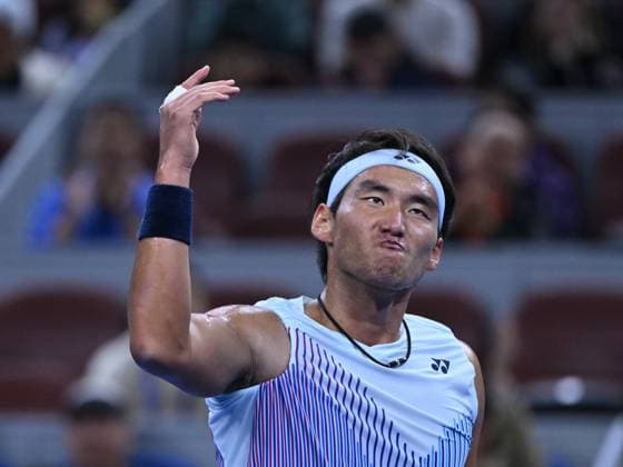 (241001) -- BEIJING, Oct. 1, 2024 -- Bu Yunchaokete of China celebrates during the men s singles semi-final match against Jannik Sinner of Italy at 2024 China Open tennis tournament in Beijing, capital of China, Oct. 1, 2024. ) (SP)CHINA-BEIJING-TENNIS-CHINA OPEN-MEN S SINGLES (CN) ZhangxLong