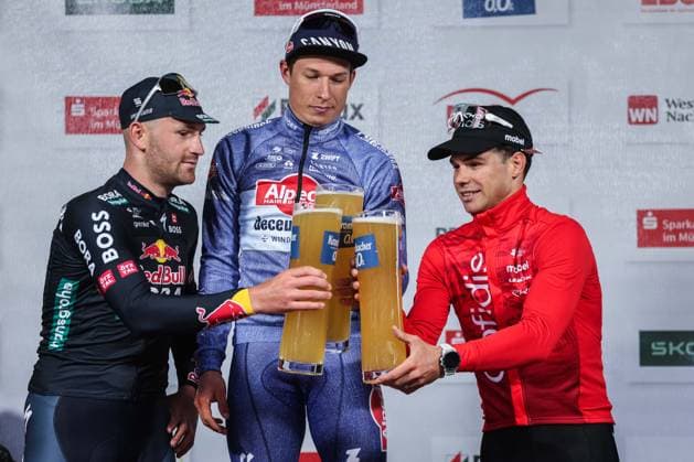Cycling UCI ProSeries Men Elite 18 Sparkassen Münsterland Giro on 03 10 2024 in Münster Jordi Meeus Redbull Bora Hansgrohe , left Jasper Philipsen Alpecin Deceunic , center Mlan Fretin Cofidis , right at the award ceremony xJRx