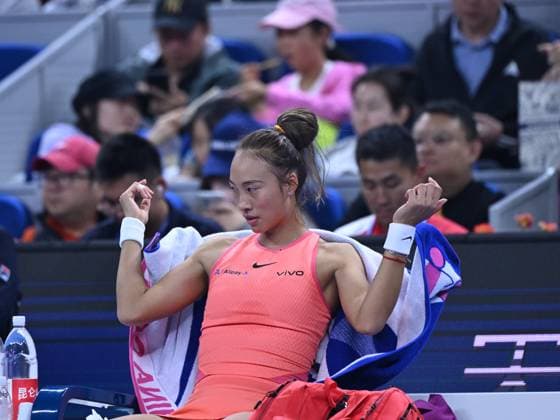 (241005) -- BEIJING, Oct. 5, 2024 -- Zheng Qinwen of China reacts during the women s singles semifinal match against Karolina Muchova of the Czech Republic at 2024 China Open tennis tournament in Beijing, capital of China, Oct. 5, 2024. ) (SP)CHINA-BEIJING-TENNIS-CHINA OPEN-WOMEN S SINGLES(CN) ZhangxLong