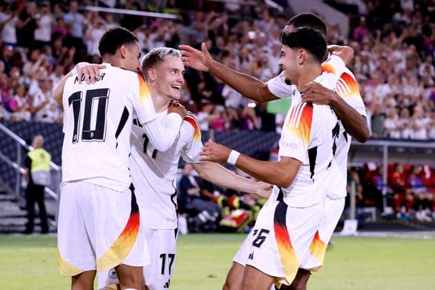 WIRTZ Florian Team Germany cheers after his goal with MUSIALA Jamal and PAVLOVIC Aleksandar UEFA Nations League 2025 match Germany Hungary 5 0 on 07 09 2024 in Duesseldorf DFL REGULATIONS PROHIBIT ANY USE OF PHOTOGRAPHS as IMAGE SEQUENCES and or QUASI VIDEO Copyright: xLacixPerenyix