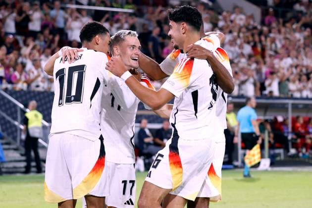WIRTZ Florian Team Germany cheers after his goal with MUSIALA Jamal and PAVLOVIC Aleksandar UEFA Nations League 2025 match Germany Hungary 5 0 on 07 09 2024 in Duesseldorf DFL REGULATIONS PROHIBIT ANY USE OF PHOTOGRAPHS as IMAGE SEQUENCES and or QUASI VIDEO Copyright: xLacixPerenyix