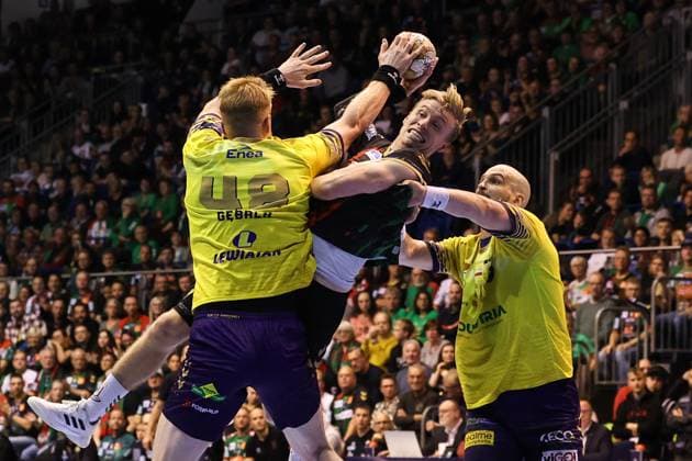 Gisli Kristjansson SC Magdeburg,10 vs Tomasz Gebala l ,KS Kielce,48 and Artsem Karalek KS Kielce,50 Handball EHF Champions League Season 2024 2025 Group B SC Magdeburg vs Industria Kielce in the GETEC Arena in Magdeburg Action,Handball,Germany,10 10 2024