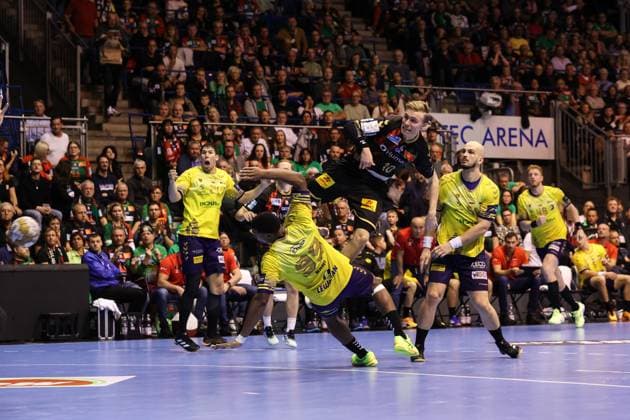 Gisli Kristjansson SC Magdeburg,10 vs Dylan Nahi KS Kielce,99 and Artsem Karalek KS Kielce,50 Handball EHF Champions League Season 2024 2025 Group B SC Magdeburg vs Industria Kielce at the GETEC Arena in Magdeburg Action,Handball,Germany,10 10 2024
