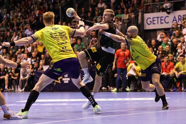 Gisli Kristjansson SC Magdeburg,10 vs Tomasz Gebala l ,KS Kielce,48 and Artsem Karalek KS Kielce,50 Handball EHF Champions League Season 2024 2025 Group B SC Magdeburg vs Industria Kielce in the GETEC Arena in Magdeburg Action,Handball,Germany,10 10 2024