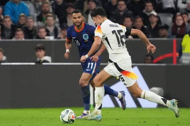 Aleksandar Pavlovic Germany Germany, 16 vs Cody Gakpo Netherlands, Netherlands, 11 Munich 14 10 2024 Germany vs Netherlands, Nations League, Matchday 4