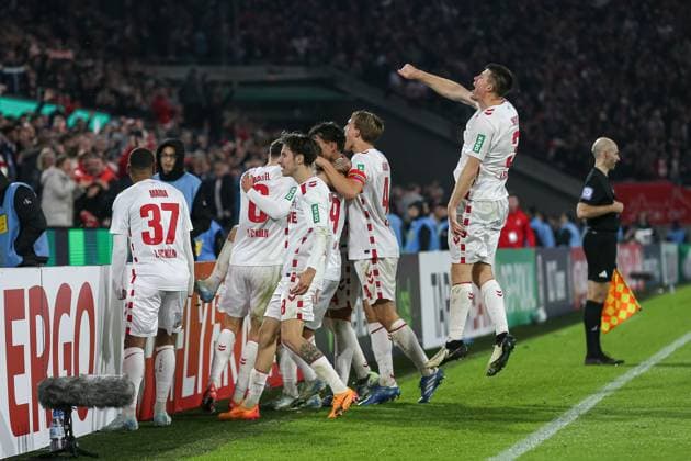 Luca Waldschmidt 1 FC Koeln celebrates after scoring his team s second goal with teammates during the second round of DFB Pokal match between 1 FC Koeln and Holstein Kiel, RheinEnergieStadion on October 29, 2024 in Cologne, Germany, Germany Photo by Oliver Kaelke DeFodi Images Luca Waldschmidt 1 FC Koeln celebrates after scoring his team s second goal with teammates during the second Round of DFB Pokal match between 1 FC Köln and Holstein Kiel at RheinEnergieStadion on October 29, 2024 in Cologne, Germany Photo by Oliver Kaelke DeFodi Images DFL regulations prohibit any use of photographs as image sequences and or quasi video not used in POL SRB CRO FRA GBR NED ITA USA Defodi 678 2024 10 29 OK KOEKSV 1818 Defodi-678 not used in POL SRB CRO FRA GBR NED ITA USA DFL regulations prohibit any use of photographs as image sequences and or quasi-video.