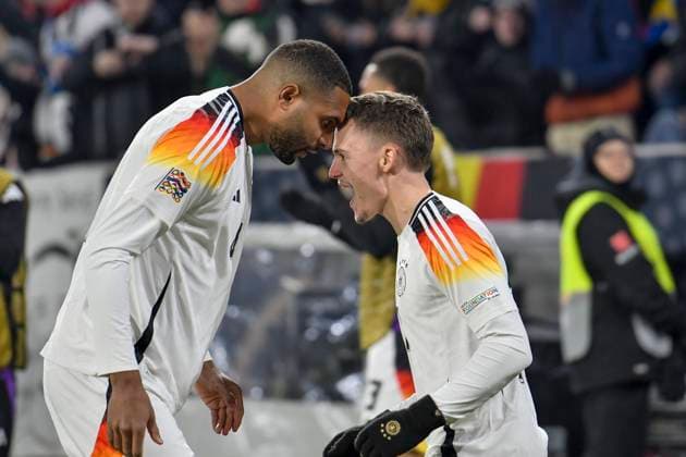 Florian Wirtz Germany 17 celebrates after scoring 4 0 with Jonathan Tah Germany 4 16 11 2024 Football UEFA Nations League Germany vs Bosnia and Herzegovina, Europa Park Stadion, Freiburg, Baden Württemberg Germany Copyright: xpepphotox xHorstxMauelshagenx pep00321, pep_20241116_hm_2110