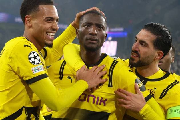 Dortmund, Germany 11 December 2024 Champions League 2024 2025 Borussia Dortmund vs FC Barcelona In the picture from left the second scorer Serhou Guirassy BVB cheers after his goal to 1 1 with Emre Can BVB , right in the picture, and Felix Nmecha BVB , left in the picture Signal Iduna Park Nordrhein Westfalen Copyright: xFotostandx xFantinix