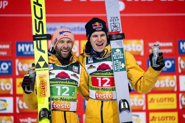PASCHKE Pius Germany , WELLINGER Andreas Germany celebrate victory on the podium at the award ceremony, GER, FIS Viessmann Ski Jumping World Cup Titisee Neustadt, Super Team Jumping, 2024 2025 season, 13 12 2024 GER, FIS Viessmann Ski Jumping World Cup Titisee Neustadt, Super Team Jumping, 2024 2025 season, 13 12 2024 Titisee Neustadt Copyright: xEibner-Pressefoto Memmlerx EP_MMR