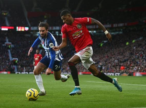 Manchester United, ManU v Brighton and Hove Albion - Premier League - Old Trafford November 10, 2019, Manchester, United Kingdom: Marcus Rashford of Manchester United surges past Davy Propper of Brighton during the Premier League match at Old Trafford, Manchester. Picture date: 10th November 2019. Picture credit should read: Phil Oldham Sportimage Manchester United Kingdom EDITORIAL USE ONLY Copyright: xx ZUMA-20191110_zaf_si1_085.jpg PhilxOldhamx csmphototwo609201