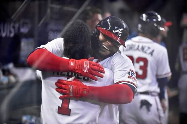 MLB, Baseball Herren, USA 2021: Philadelphia Phillies vs Atlanta Braves MAY 08 May 08, 2021: Atlanta Braves infielder Pablo Sandoval hugs a teammate in the dugout after hitting a game tying home run during the ninth inning of a MLB game against the Philadelphia Phillies at Truist Park in Atlanta, GA. The Braves won in extra innings. Austin McAfee CSM Atlanta Georgia USA EDITORIAL USE ONLY Copyright: xx ZUMA-20210508_zaf_c04_226.jpg AustinxMcafeex csmphototwo741927