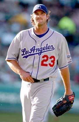 Los Angeles Dodgers starting pitcher Derek Lowe heads to the dug out after strinking out Oakland Athletics Bobby Crosby at the end of the first inning on Saturday, June 17, 2006, at McAfee Colisium in Oakland, California. (Susan Tripp Pollard Contra Costa Times KRT) OAKLAND CA USA EDITORIAL USE ONLY Copyright: x2004xContraxCostaxTimesx 1031803 SusanxTrippxPollardx krtphotoslive218137