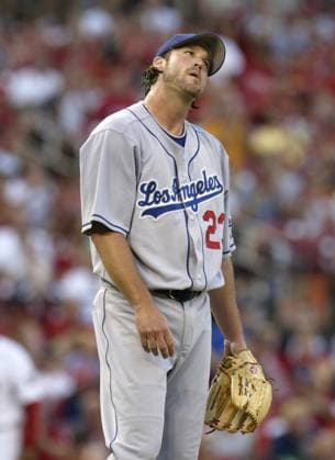 Los Angeles Dodgers starting pitcher Derrek Lowe tries to regroup after allowing a lead-off single to the St. Louis Cardinals David Eckstein in the first inning. The Cardinals defeated the Dodgers, 5-0, at Busch Stadium in St. Louis, Missouri, Friday, July 14, 2006. (Chris Lee St. Louis Post-Dispatch MCT) ST LOUIS MO USA EDITORIAL USE ONLY Copyright: xx 1032776 ChrisxLeex krtphotoslive220984