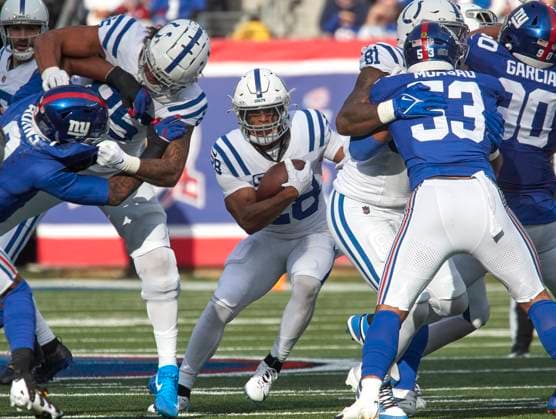 Indianapolis Colts running back Jonathan Taylor (28) looks for running room against then New York Giants during a NFL, American Football Herren, USA game at MetLife Stadium in East Rutherford, New Jersey on Sunday December 29, 2024. CSM. East Rutherford United States - ZUMAc04_ 20241229_zma_c04_089 Copyright: xDuncanxWilliamsx