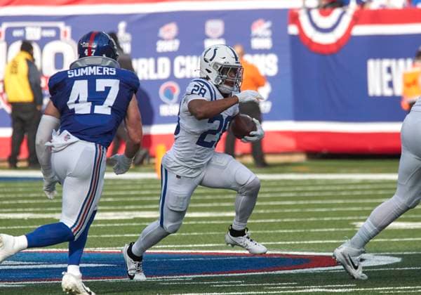 Indianapolis Colts running back Jonathan Taylor (28) looks for running room against then New York Giants during a NFL, American Football Herren, USA game at MetLife Stadium in East Rutherford, New Jersey on Sunday December 29, 2024. CSM. East Rutherford United States - ZUMAc04_ 20241229_zma_c04_093 Copyright: xDuncanxWilliamsx