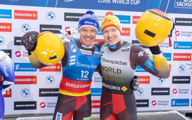 photographer FIL Michael Kristen 11 01 2025 5 FIL Eberspächer Luge World Cup, SachsenEnergie Ice Track Altenberg, Sachsen GER , WC Germany, Men™s Singles, Winners Presentation, picture Felix Loch GER , Max Langenhan GER