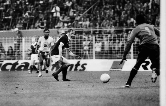 Football - 1974 World Cup - First Round, Group Two: Scotland 2 Zaire 0 Scotland s Denis Law and Zaire goalkeeper Kazadi Muamba ( 1) at Westfalenstadion, Dortmund, West Germany.