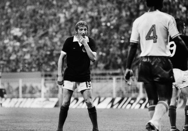 Football - 1974 World Cup - First Round, Group Two: Scotland 2 Zaire 0 Scotland s Denis Law sees a shot go wide at Westfalenstadion, Dortmund, West Germany.