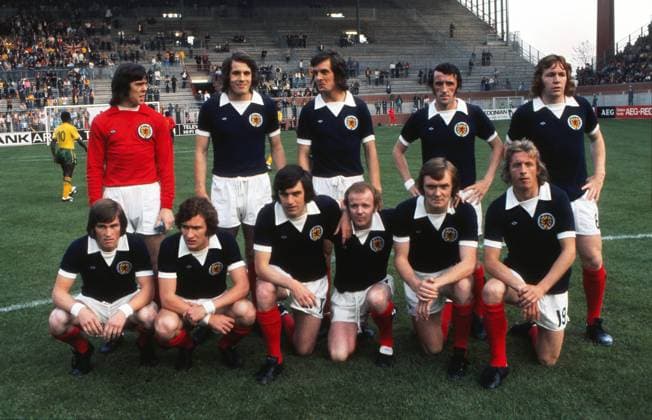 Football - 1974 World Cup - First Round, Group Two: Scotland 2 Zaire 0 14 06 1974 Scotland team group, Mannschaftsbild, Totale - back row l-r. David Harvey, Jim Holton, Joe Jordan, Danny McGrain,John Blackley. front - Kenny Dalglish , Sandy Jardine, Peter Lorimer, Billy Bremner,David Hay and Denis law at Westfalenstadion, Dortmund, West Germany.