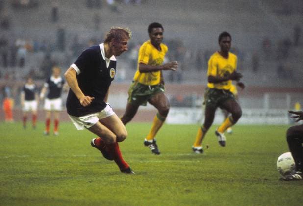 Football - 1974 World Cup - First Round, Group Two: Scotland 2 Zaire 0 14 06 1974 Denis Law of Scotland has his shot saved at Westfalenstadion, Dortmund, West Germany.