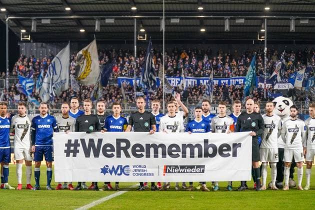 Germany 2 Bundesliga 2024 2025, Matchday 20 SV Elversberg vs Karlsruher SC Ursapharm Arena an der Kaiserlinde Elversberg Commemoration of the Holocaust, WeRemember, Never again, Anti-Semitism, Culture of remembrance, Sport against hate, 2 Bundesliga, Solidarity, World Jewish Congress, stadium, fans, banner, fair play, UEFA, FIFA, defending democracy, right-wing extremism, fan protests, political messages in sport, conveying values, symbol of social commitment, cohesion, human rights, tolerance, education against prejudice Copyright: xJOERANxSTEINSIEKx