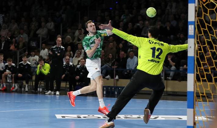 Mathias Gidsel scores a goal against goalkeeper Martin Tomovski duel Game scene Action Sport Handball HBL Bundesliga Men 18 Matchday Season 2024 2025 09 02 2025 Füchse Berlin vs 1 VfL Potsdam