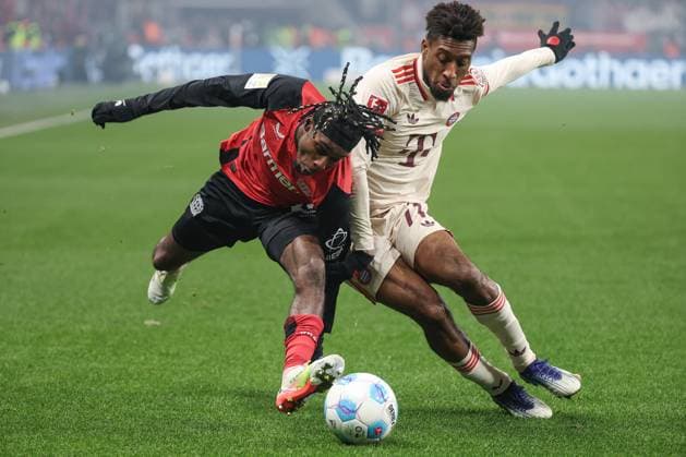 1 Bundesliga Bayer 04 Leverkusen FC Bayern Munich on 15 02 2025 at the BayArena in Leverkusen Jeremie Frimpong Leverkusen 30 vs Kingsley Coman Muenchen 11 MH