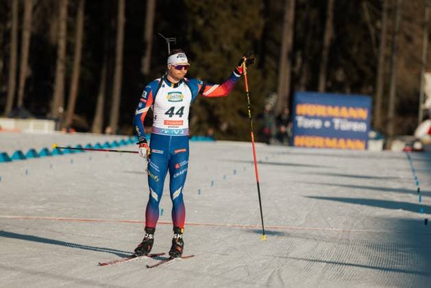 19 02 2025, Biathlon, World Championships, Season 2024 2025, Lenzerheide, World Championships, Men, 20km Individual Emilien Jacquelin FRA 44 at the finish waving to the fans Lenzerheide Roland Arena GR Switzerland