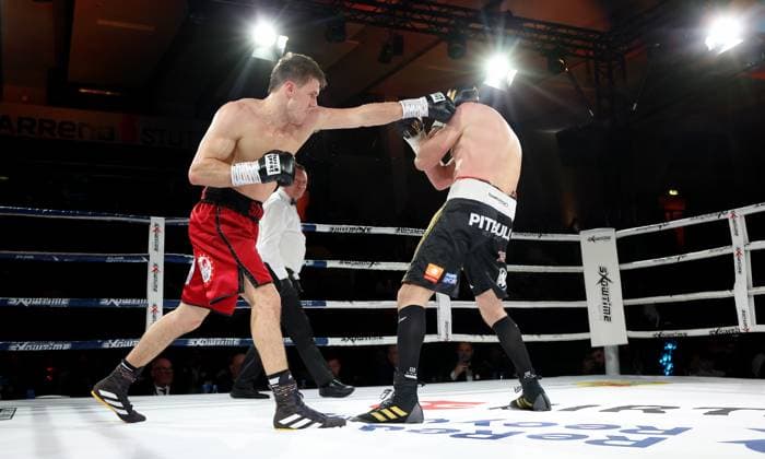 BAU 22 02 2025 Stuttgart Boxing Stuttgart Boxing Night, Simon Zachenhuber GER, red vs Robert Talarek Poland, black