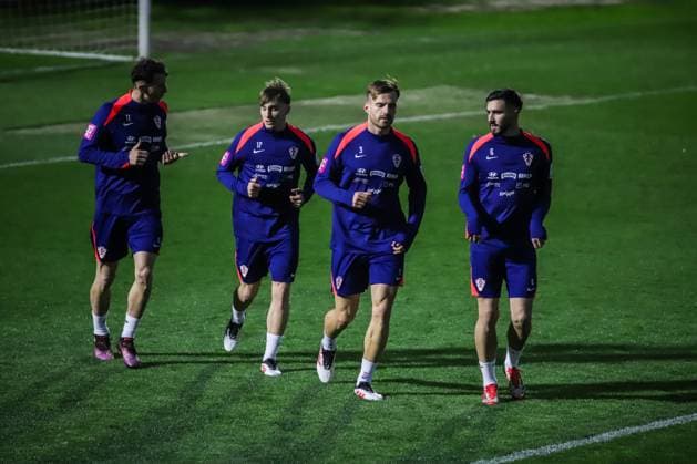 Training session of Croatian National Football Team Croatia s Ante Budimir, Toni Fruk, Marin Pongracic and Josip Sutalo warm up during training session of Croatian National Football Team at Poljud Stadium on March 17, 2025 in Split, Croatia. Croatia will play UEFA League of Nations match against France on March 20.  ZvonimirxBarisin PIXSELL