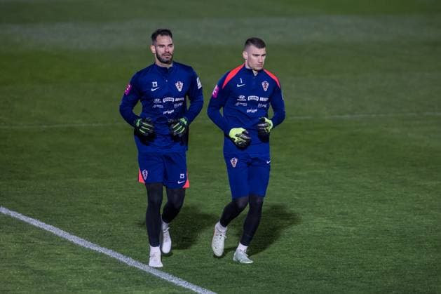Training session of Croatian National Football Team Goalkeepers of Croatia Ivica Ivusic and Dominik Livakovic warm up during training session of Croatian National Football Team at Poljud Stadium on March 17, 2025 in Split, Croatia. Croatia will play UEFA League of Nations match against France on March 20.  ZvonimirxBarisin PIXSELL