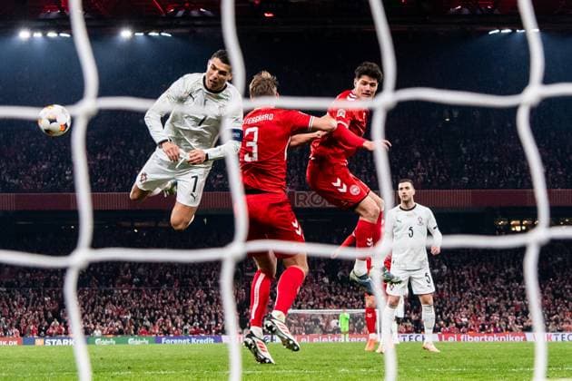 250320 Cristiano Ronaldo of Portugal against Jannik Vestergaard an Joakim Maehle of Denmark during the Nations League football match between Denmark and Portugal on March 20, 2025 in Copenhagen Photo Petter Arvidson BILDBYRAN kod PA PA0995 bbeng fotboll football soccer fotball nations league uefa nations league danmark denmark portugal bbauto  Copyright: PETTERxARVIDSON BB250320PA134